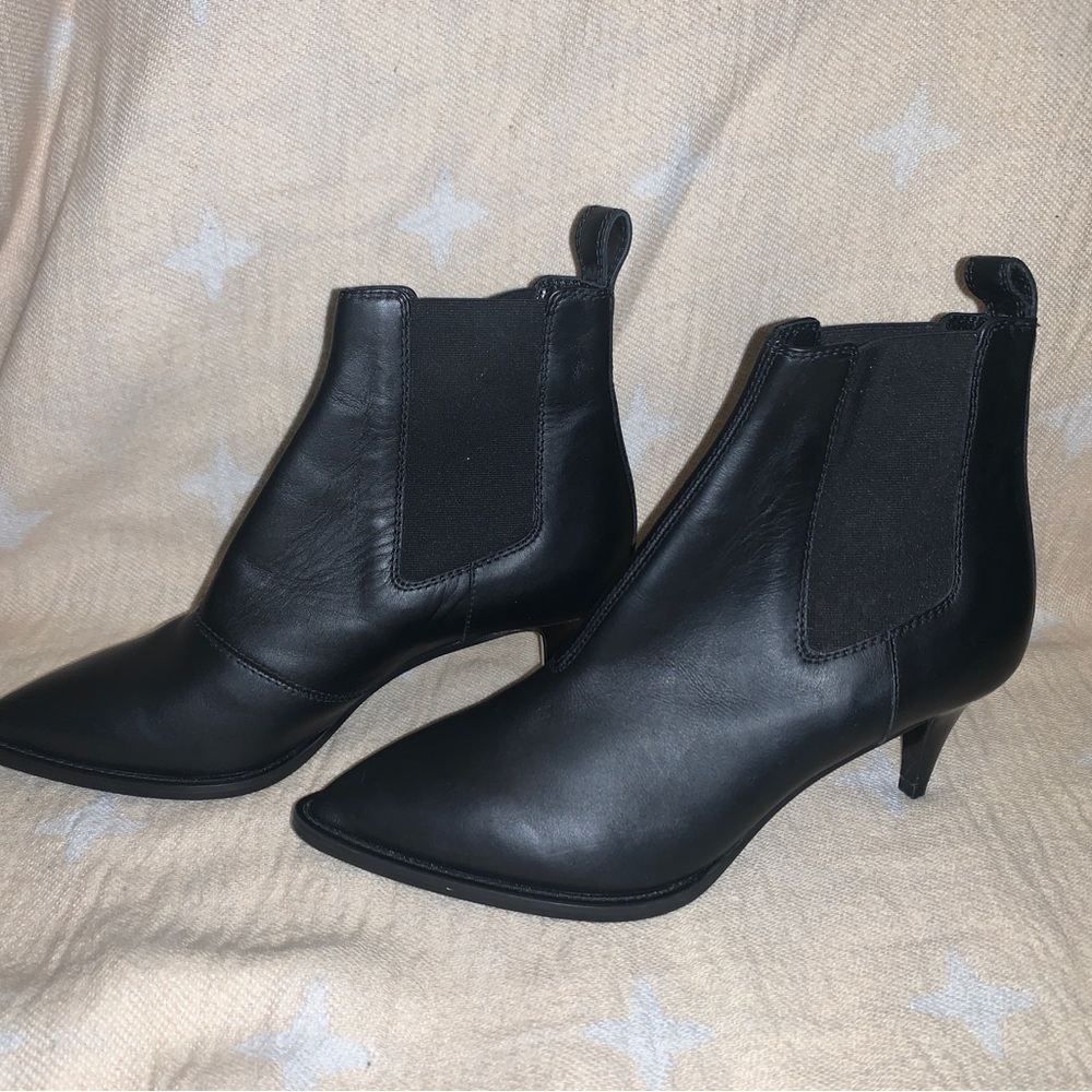Sexy black leather Moschino booties.